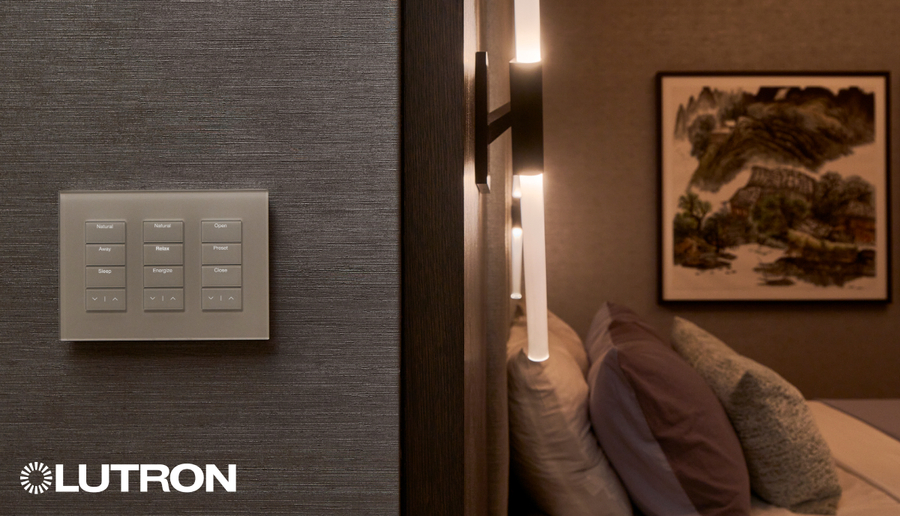 Lutron Palladiom keypad on a textured bedroom wall featuring custom buttons like Relax and Sleep for lighting control.