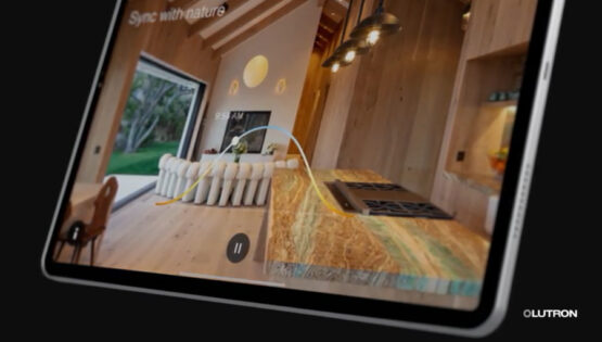 Lutron app displaying a "Sync with Nature" lighting scene above a sunlit kitchen with a marble island.